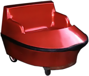 A red cart from the Phantasmagoria haunted-house stands empty, awaiting a rider.