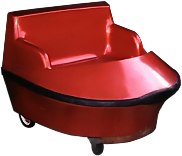 A red cart from the Phantasmagoria haunted-house stands empty, awaiting a rider.